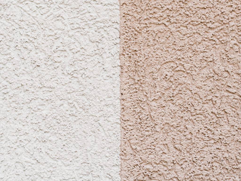 Stucco wall texture finish with warm earthy tones for modern homes