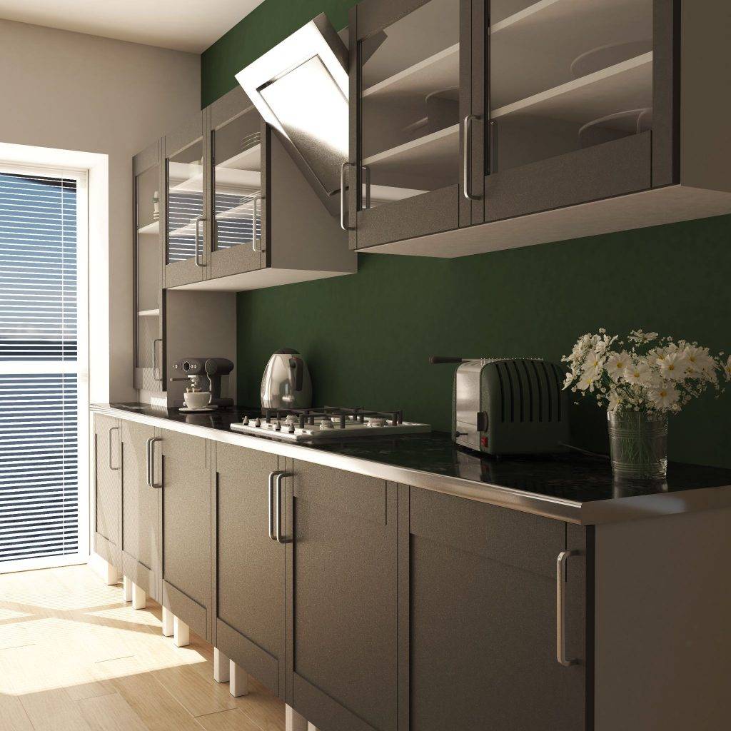Dark kitchen cabinets paired with light wall colours for balanced interiors
